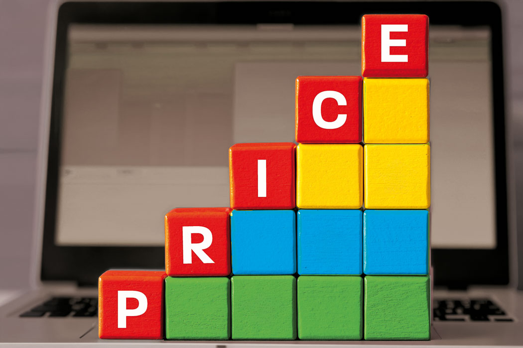 Building blocks in Microsoft colours stacked in increasing heights to represent the Microsoft 356 price increases.